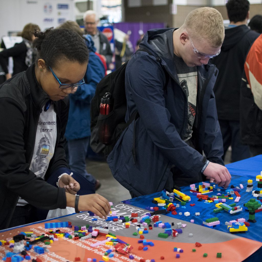 Students interact with exhibits at the 10th annual Pierce County Career Day on Nov. 8, 2017.