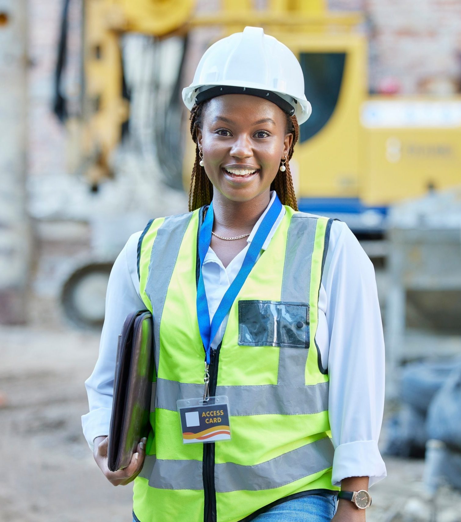 Happy engineer, construction worker or architect woman feeling proud and satisfied with career opportunity. Portrait of black building management employee or manager working on a project site